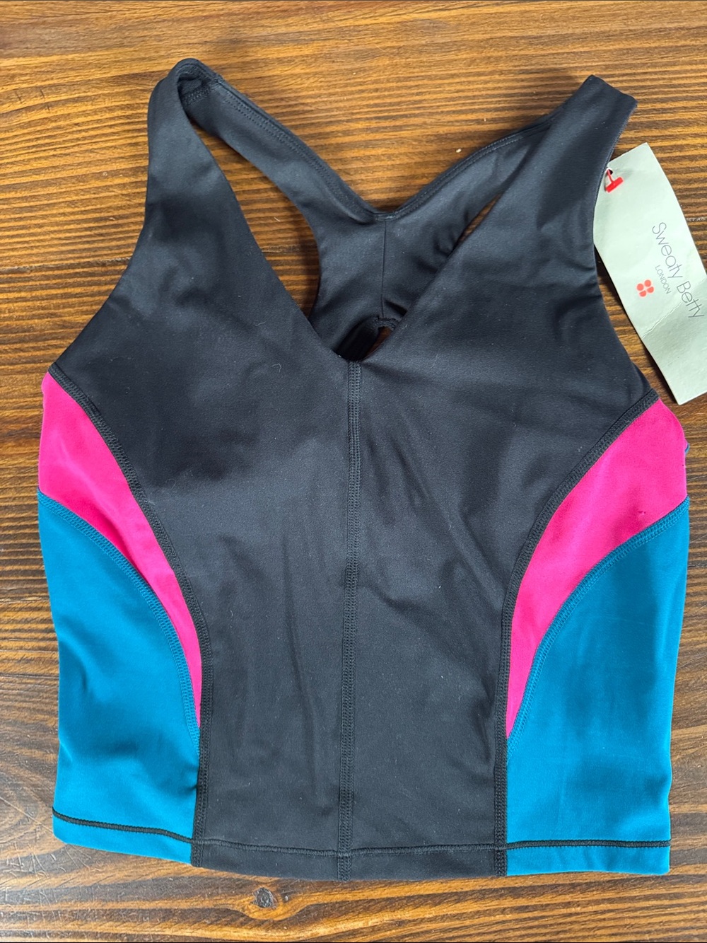 Sweaty Betty Black Sports Bra with Pink and Teal Panels